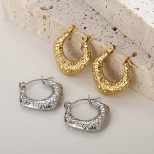Minimalist C-shaped textured hoop earrings in gold and silver finish for women