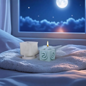 Square silicone candle mold for DIY aromatherapy with spiral texture relief and finished candle