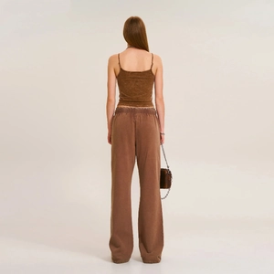 Rear view of vintage brown cotton camisole and matching wide-leg pants set for women
