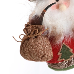 Plush Santa Claus Christmas curtain tieback with burlap sack and festive details