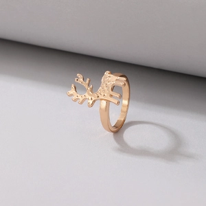 Detail of rose gold reindeer ring featuring unique hammered texture and open band design