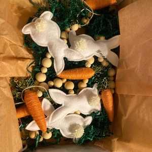 Handmade Easter bunny carrot garland with white felt rabbits and natural wooden beads