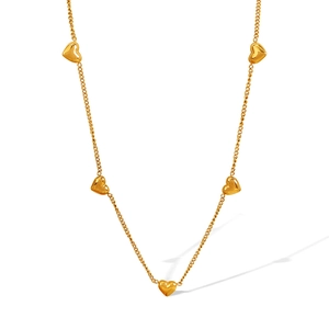 Elegant gold chain necklace featuring five solid heart pendants on a clean white background