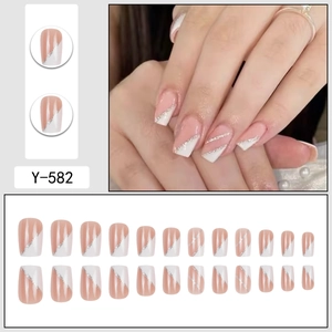 Pink French press-on nails with white diagonal glitter edges and Y-582 model details