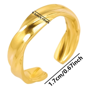 Detail showing 0.5cm width and 1.7cm diameter of golden twisted stainless steel ring