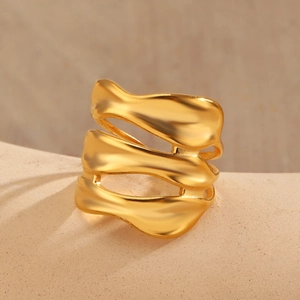 Minimalist gold irregular wave ring with liquid metal texture and matte finish