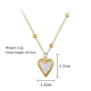 Detail view of gold heart necklace with white mother-of-pearl and 40+5cm chain size specs