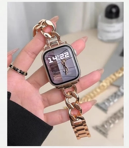 Detail of rose gold metal chain watch band with luxury perfume background and jewelry styling