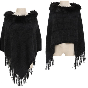 Front and back view of a black knit chenille poncho with fur collar and tassel fringe details