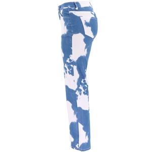 Detailed side view of high-waisted blue and white cloud pattern tie-dye denim jeans