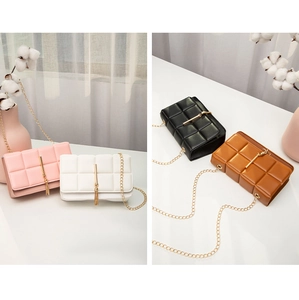 Quilted crossbody bags in four colors with gold tassels and chain straps in home setting