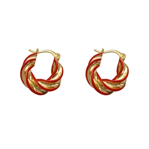 Twisted spiral gold and red enamel earrings with a vintage geometric circle design