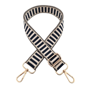 Adjustable black and white striped bag strap with premium gold metal clasps and hardware