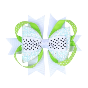 Detail of layered bow hair clip with green ribbon and white sequins for girls