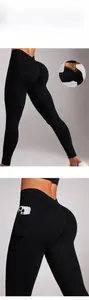 Detailed view of high-waist black yoga pants featuring V-back design and side phone pockets