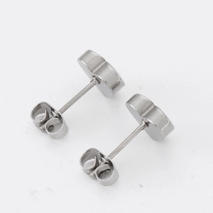 Minimalist silver stainless steel heart-shaped stud earrings with secure butterfly backing