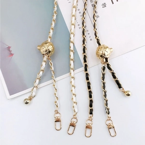 Adjustable gold chain shoulder strap with leather weave and metal ball slide buckle