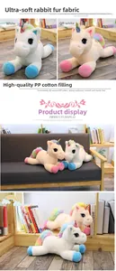 Close-up of fluffy rainbow unicorn plush showing soft rabbit-like fur and pastel details