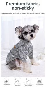 Close-up of grey pet sweater with high collar, 3D cut, and brown leather accent detail