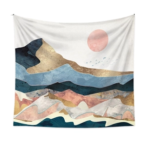 Detail of abstract mountain tapestry with golden textures and birds on white wall