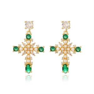 Gold-plated cross earrings with green zircon and pearls on a clean white background