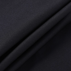 Macro texture of black knitted sports fabric showing fine weave and high elasticity