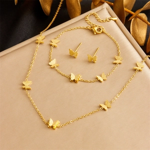 Golden stainless steel jewelry set featuring frosted butterfly necklace, bracelet and earrings