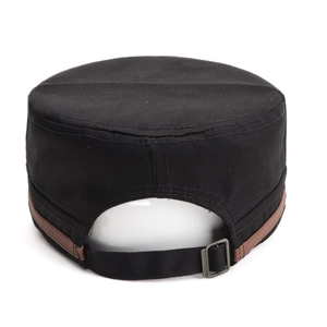 Vintage flat top military cap in black canvas with brown leather trim and metal buckle