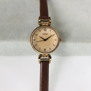 Retro GEDI women's watch with small gold dial and elegant brown leather strap