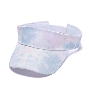 Detailed view of tie-dye sun visor featuring reinforced brim stitching and open top design