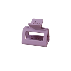 Detail of a large matte purple square hair claw clip with a strong metal spring mechanism