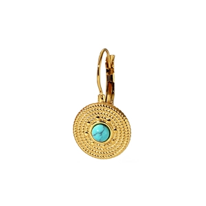 Detailed macro view of vintage gold earring featuring turquoise stone and rope textures