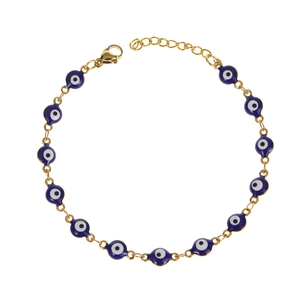 Detailed view of golden chain bracelet with blue evil eye charms and adjustable lobster clasp