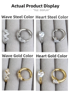 Détail de boucles d'oreilles cœur et vague avec zircone cubique en finition or et argent