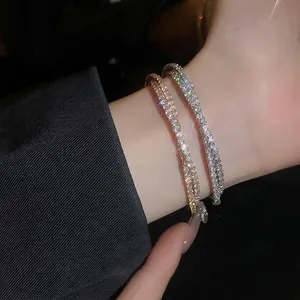 Double-layered zircon crisscross open bracelet in rose gold and silver finish