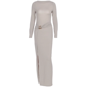 Detail of elegant slim fit maxi dress featuring metal ring buckles and side slit