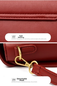 Macro detail of fine stitching and detachable golden hardware hook on dark red leather bag