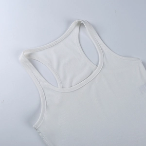 Close-up detail of white ribbed knit vest neckline and shoulder strap texture