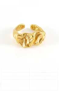 Detail showing irregular lava texture of 18K gold plated stainless steel ring with specs