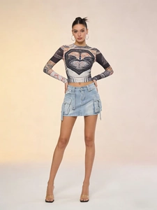 Full view of women denim cargo skirt paired with long sleeve printed t-shirt set