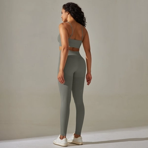 Detail of the racerback sports bra and high-waisted leggings in seamless knit fabric