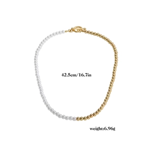 Detailed shot of half-pearl and gold bead necklace with OT buckle and size info
