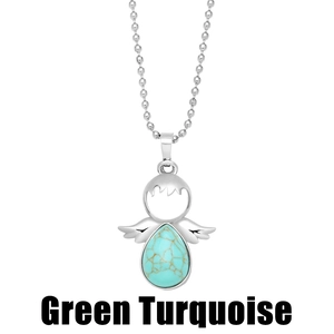 Detail of silver angel necklace with green turquoise stone on white background