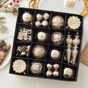60pcs gold and silver Christmas ornament set with balls and train shapes in a luxury box
