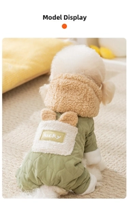 Detail of green quilted dog winter coat with lucky patch and cozy fleece collar trim