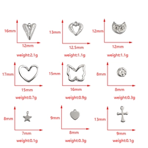 Lot de 9 pendentifs en acier inoxydable avec cœur, papillon et croix et détails techniques