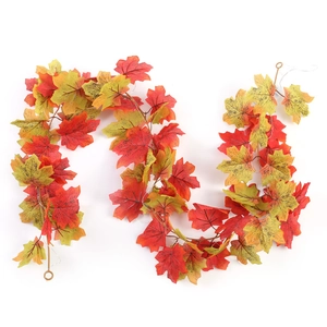 S-shaped autumn maple leaf garland with pine cones and colorful foliage for wall decor