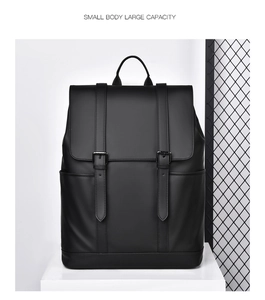 Detail of minimalist black leather backpack with small body large capacity features