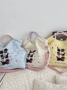 Quilted black cat embroidery tote bag in light blue, off-white, and pale yellow