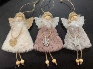 Detailed view of three plush Christmas angel ornaments in white, pink, and grey colors